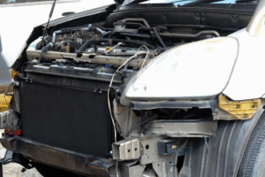 Cooling system repair in Belton, MO at Belton Transmission & Complete Auto Repair. Image of vehicle with front-end disassembled during radiator and cooling system service, helping prevent overheating and engine damage.